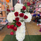 Funeral cross red roses