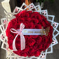 50 red coquette bouquet