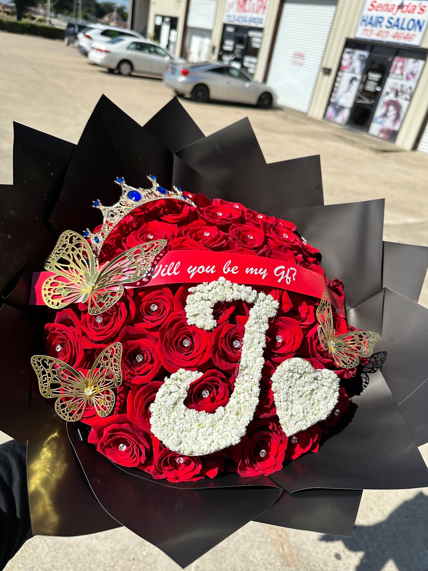 50 red roses + baby bre letter