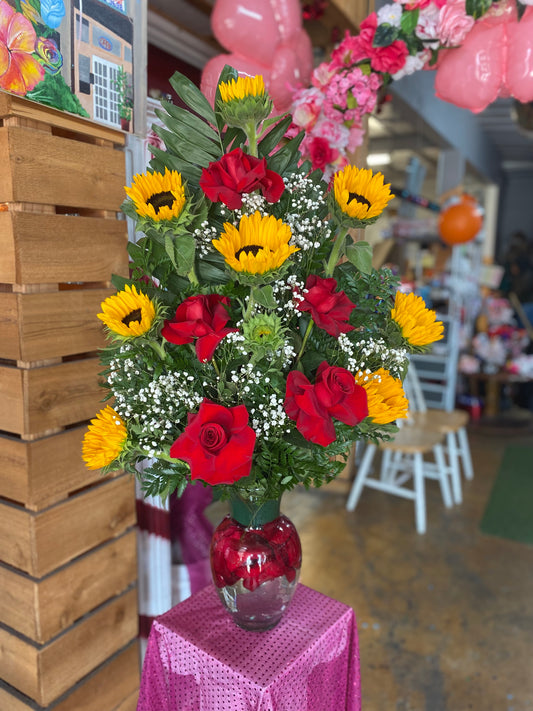 Open roses w sunflower arrangement