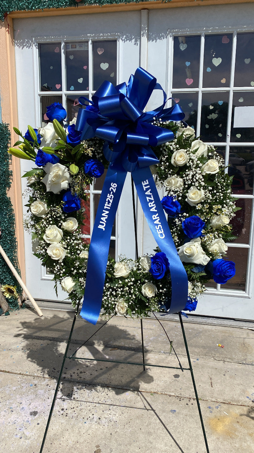 Blue wreath funeral arrangement