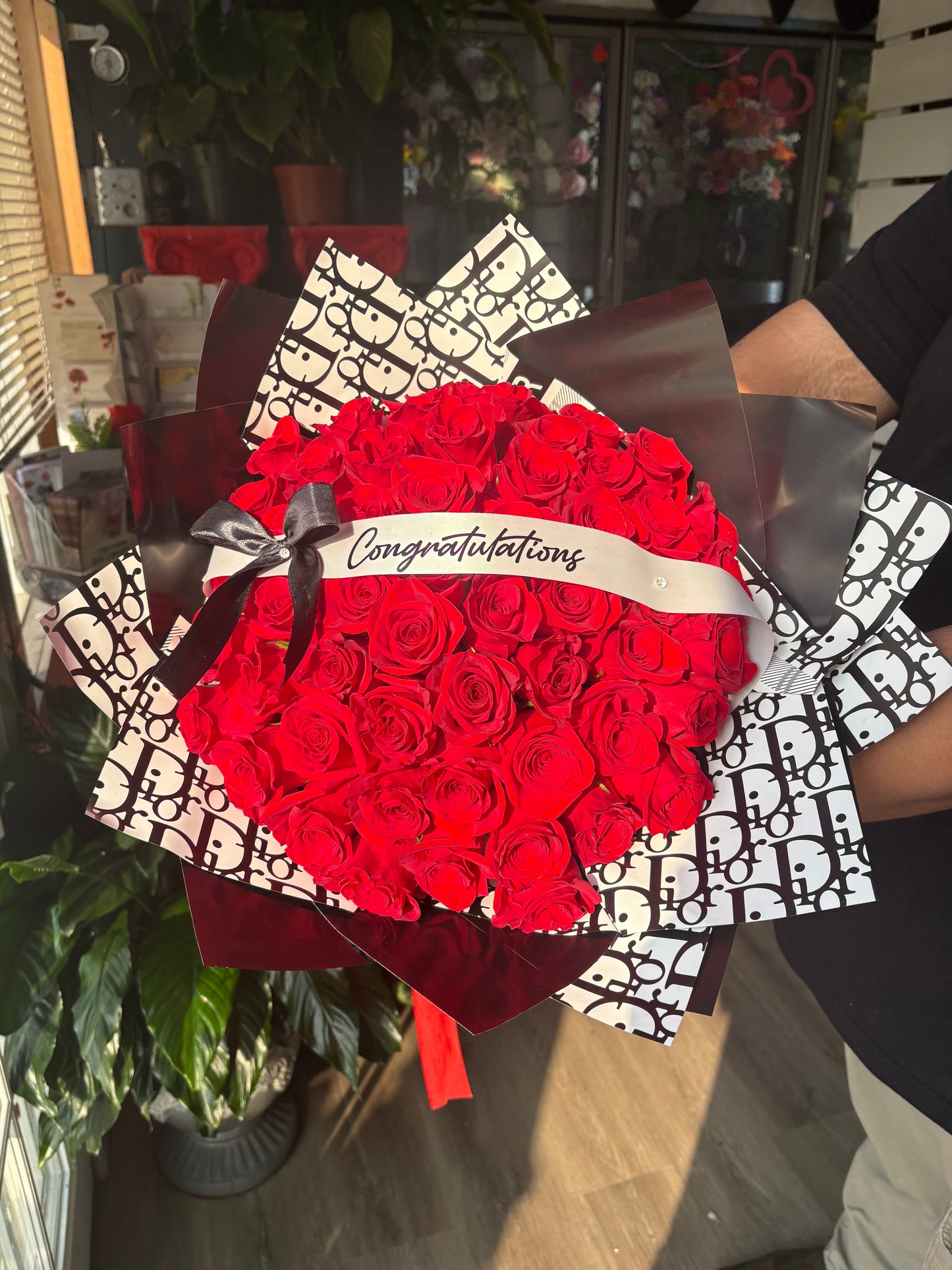 50 red on black Dior wrap