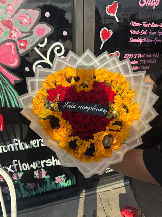 24 red roses + sunflowers around
