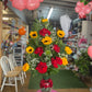 Open roses w sunflower arrangement