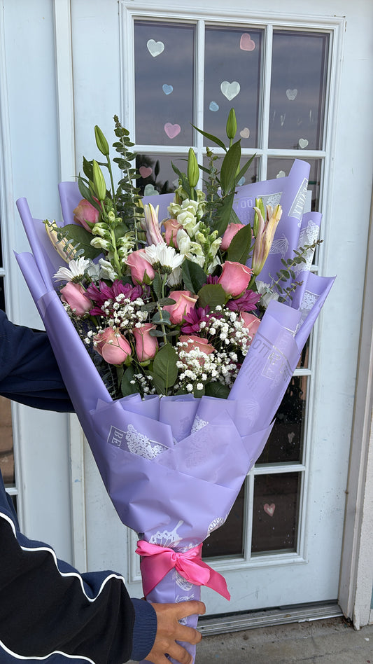Flat purple wrap bouquet