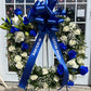 Blue wreath funeral arrangement