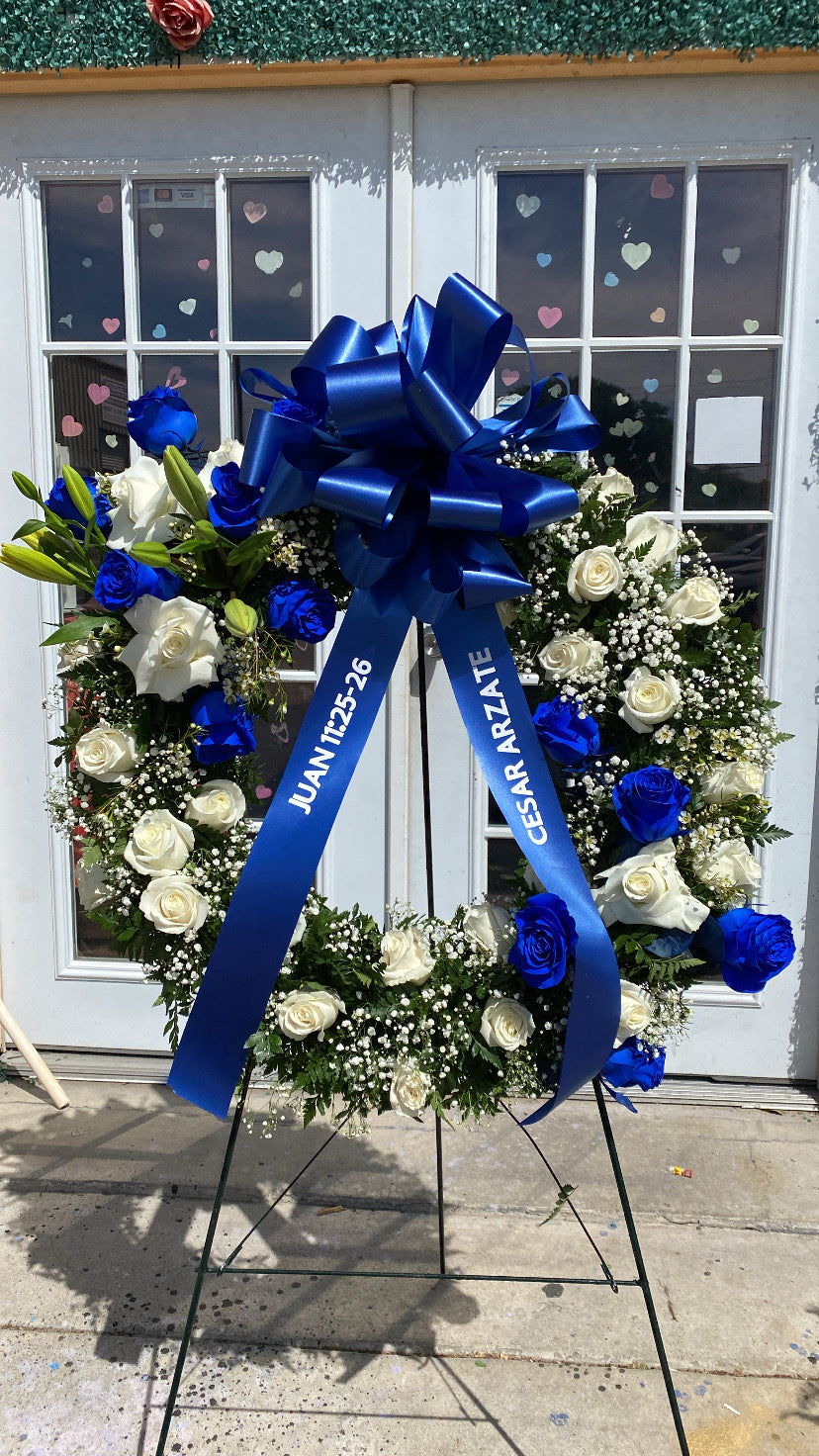 Blue wreath funeral arrangement