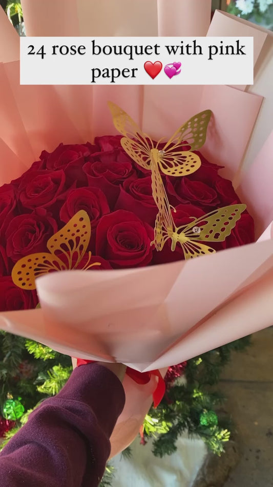 24 rose bouquet w pink paper